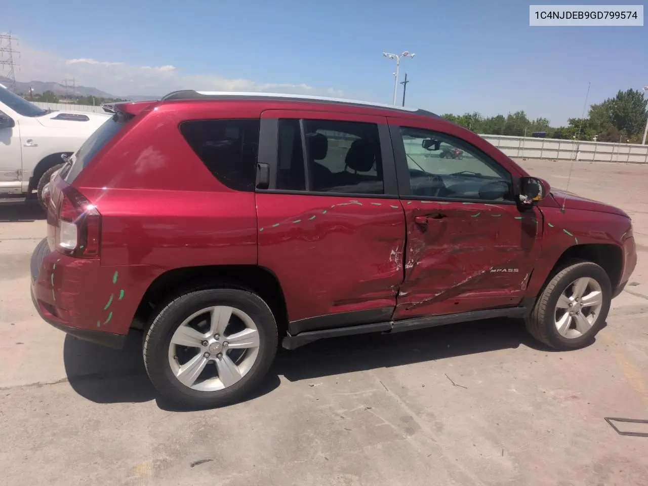 2016 Jeep Compass Latitude VIN: 1C4NJDEB9GD799574 Lot: 57171675
