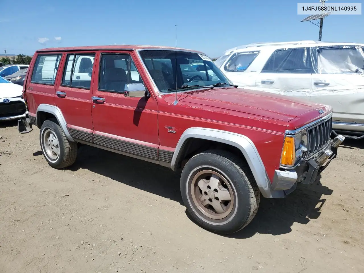 1992 Jeep Cherokee Laredo VIN: 1J4FJ58S0NL140995 Lot: 56705875