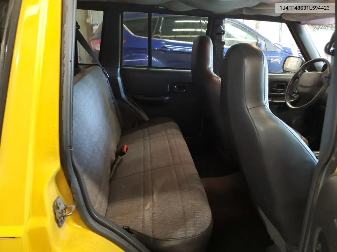 2001 Jeep Cherokee Sport VIN: 1J4FF48S31L594423 Lot: 62584895