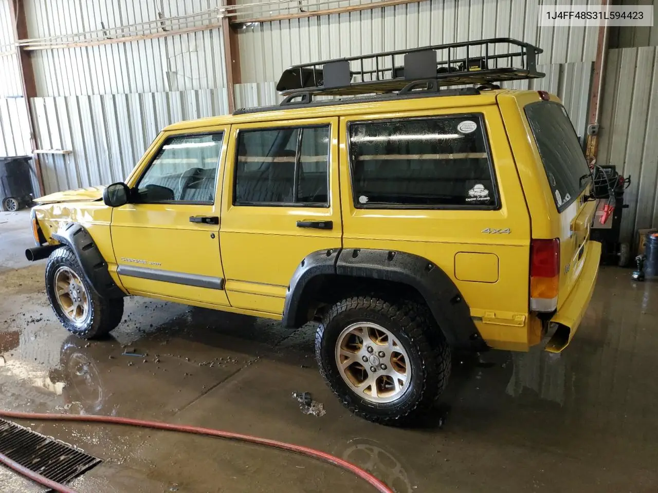 2001 Jeep Cherokee Sport VIN: 1J4FF48S31L594423 Lot: 62584895