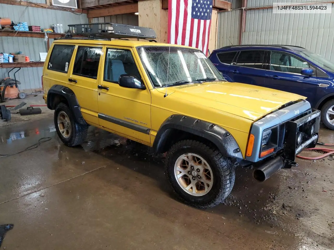 2001 Jeep Cherokee Sport VIN: 1J4FF48S31L594423 Lot: 62584895