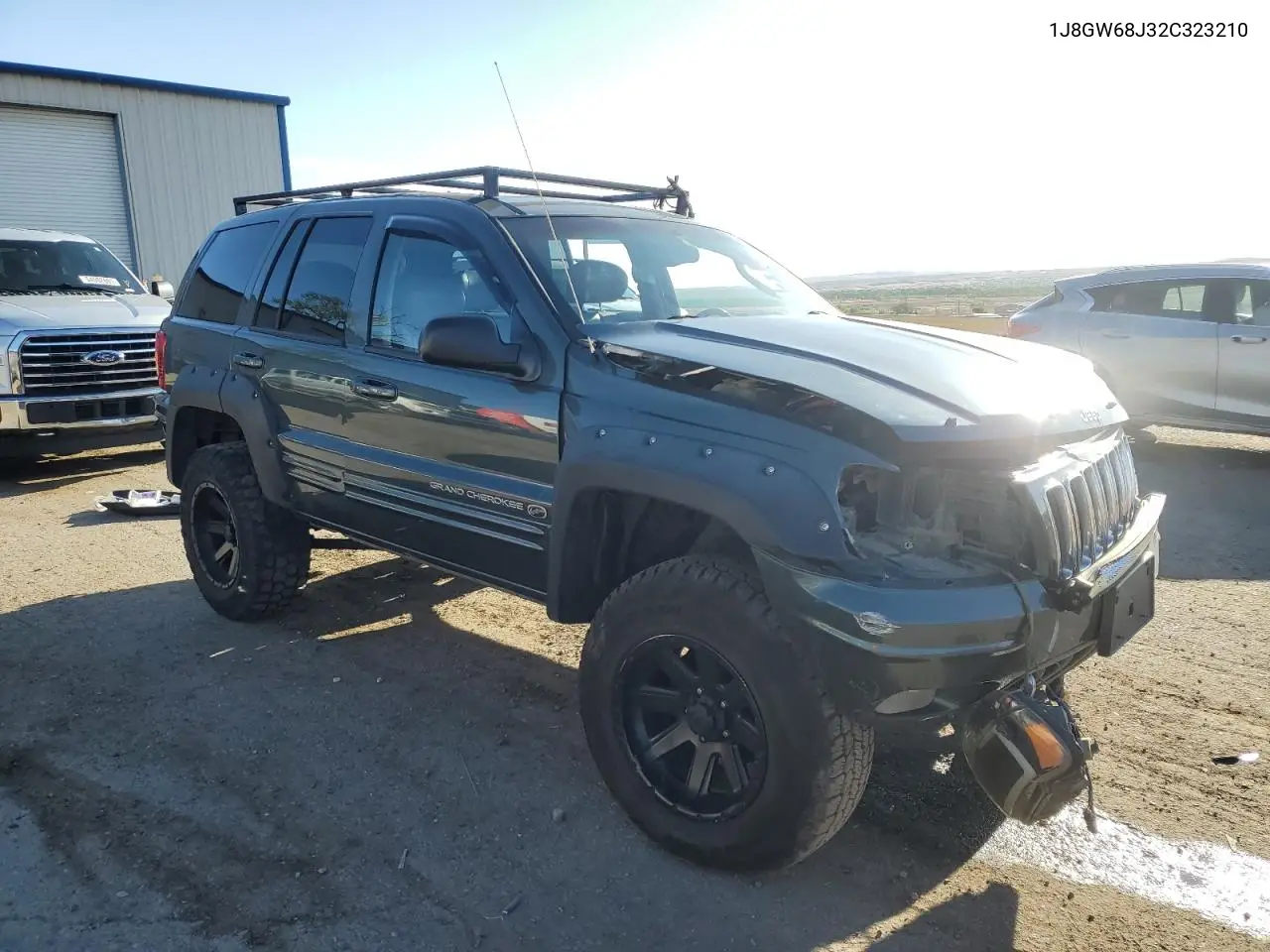 2002 Jeep Grand Cherokee Overland VIN: 1J8GW68J32C323210 Lot: 54000555