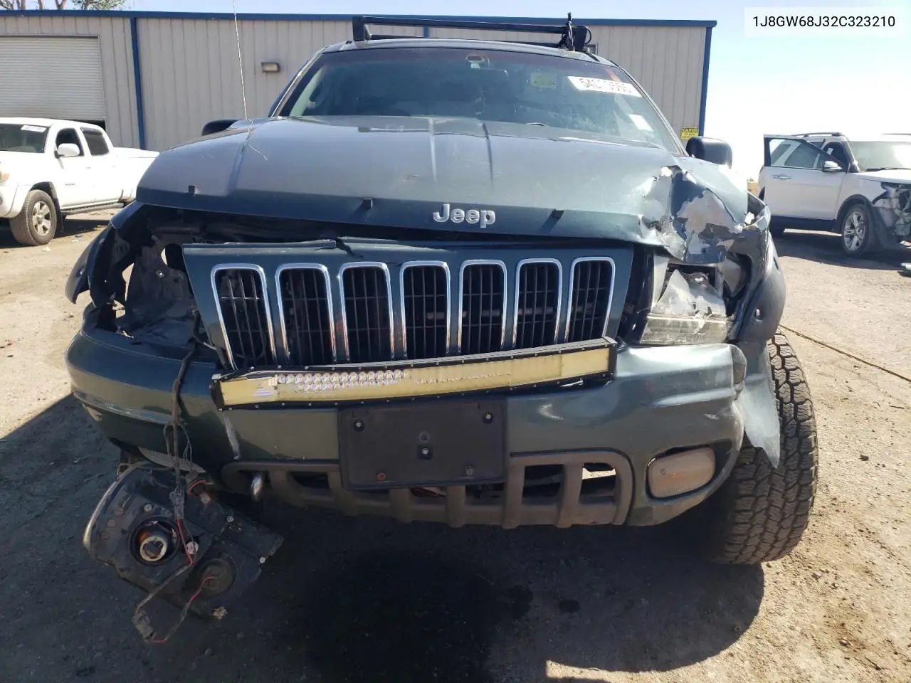 2002 Jeep Grand Cherokee Overland VIN: 1J8GW68J32C323210 Lot: 54000555