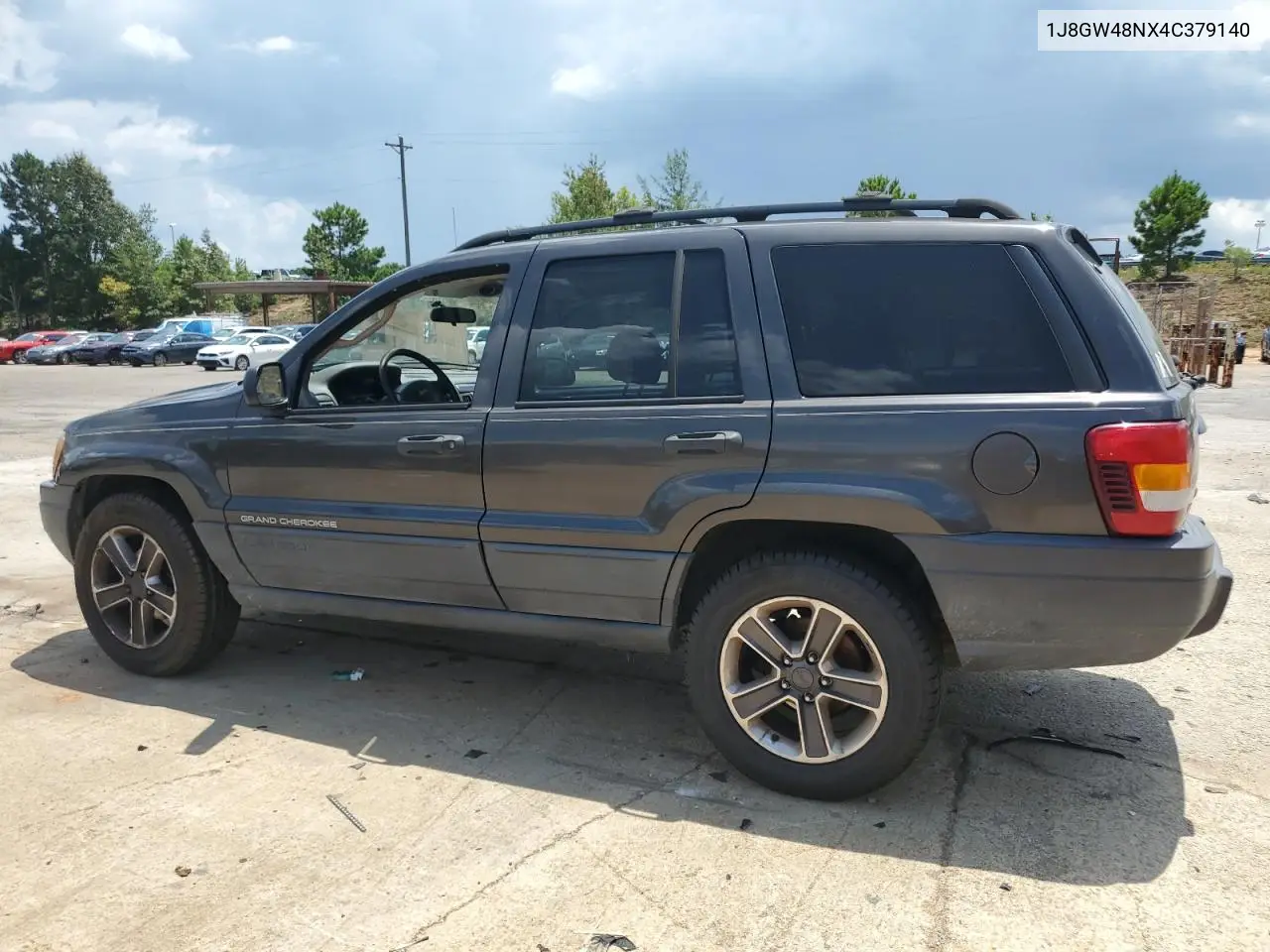 2004 Jeep Grand Cherokee Laredo VIN: 1J8GW48NX4C379140 Lot: 65070305