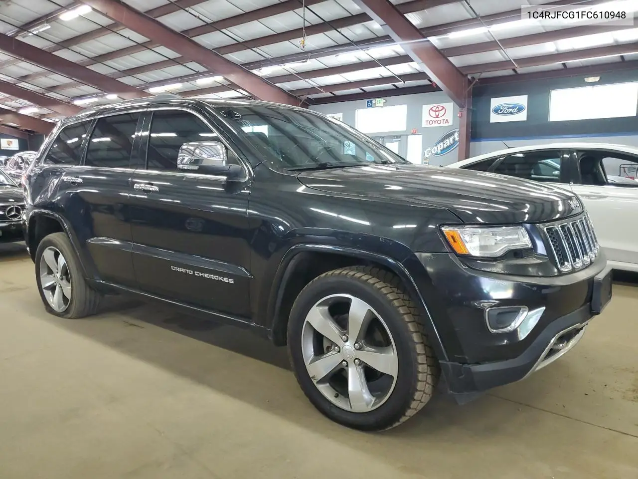 2015 Jeep Grand Cherokee Overland VIN: 1C4RJFCG1FC610948 Lot: 63037285