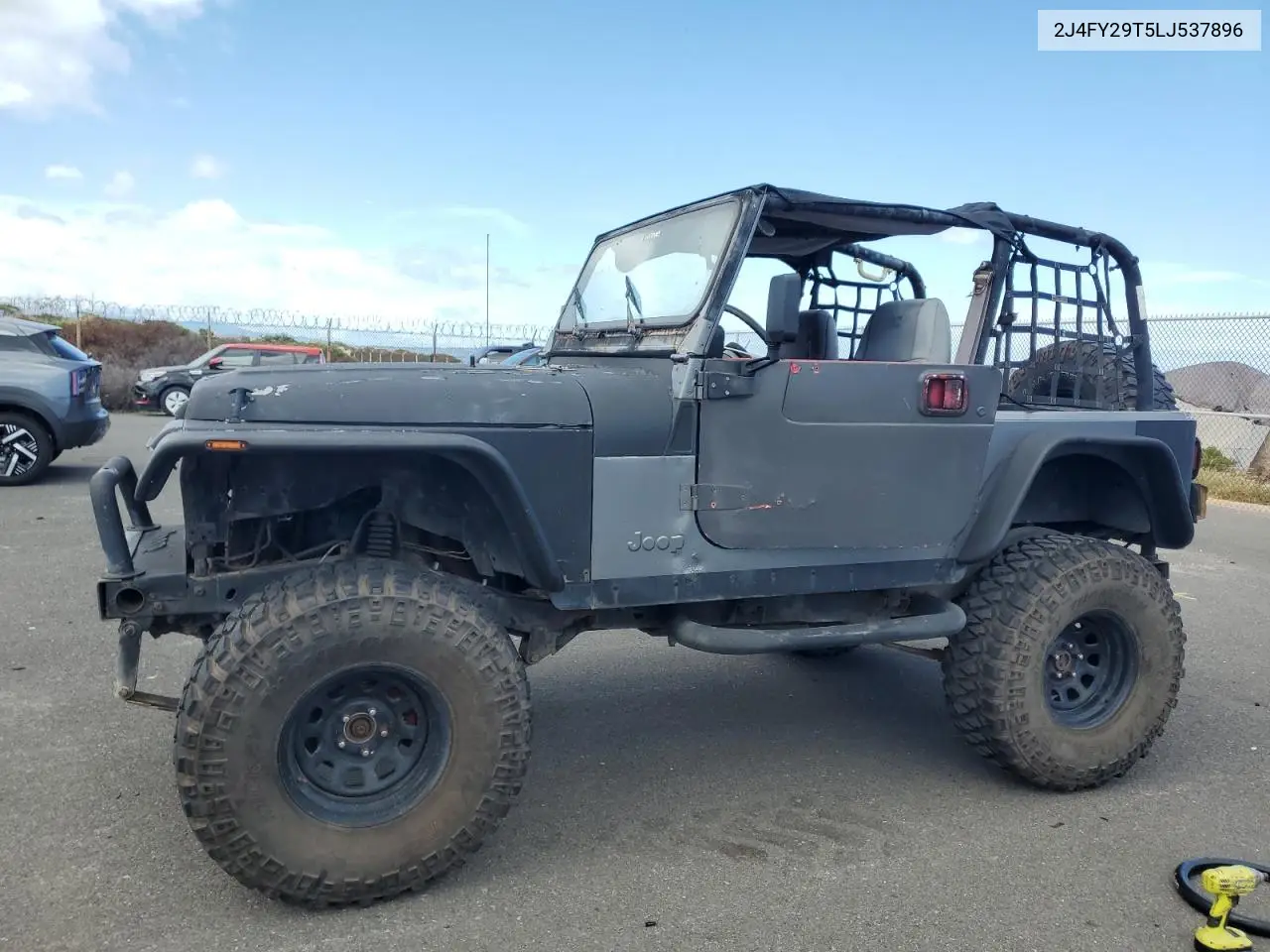 1990 Jeep Wrangler / Yj VIN: 2J4FY29T5LJ537896 Lot: 57021295