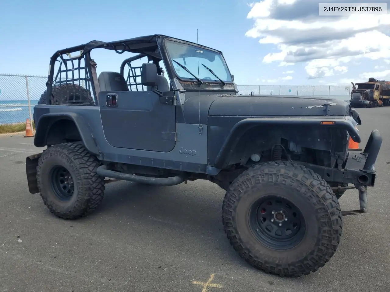 1990 Jeep Wrangler / Yj VIN: 2J4FY29T5LJ537896 Lot: 57021295