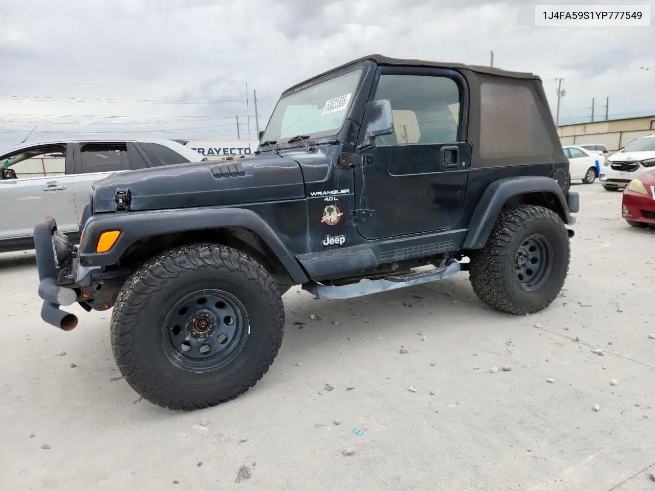 2000 Jeep Wrangler / Tj Sahara VIN: 1J4FA59S1YP777549 Lot: 63622335