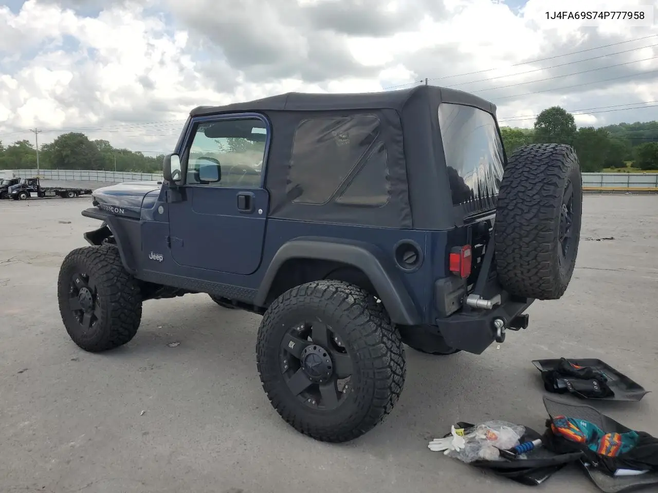 2004 Jeep Wrangler / Tj Rubicon VIN: 1J4FA69S74P777958 Lot: 55819035