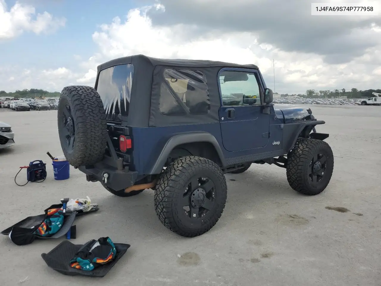 2004 Jeep Wrangler / Tj Rubicon VIN: 1J4FA69S74P777958 Lot: 55819035