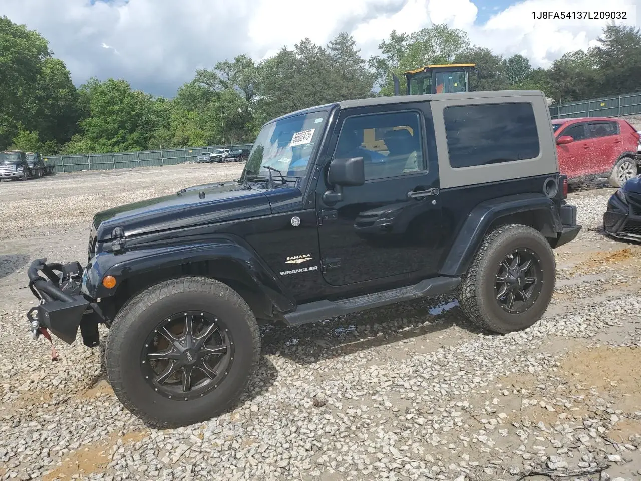 2007 Jeep Wrangler Sahara VIN: 1J8FA54137L209032 Lot: 56502475