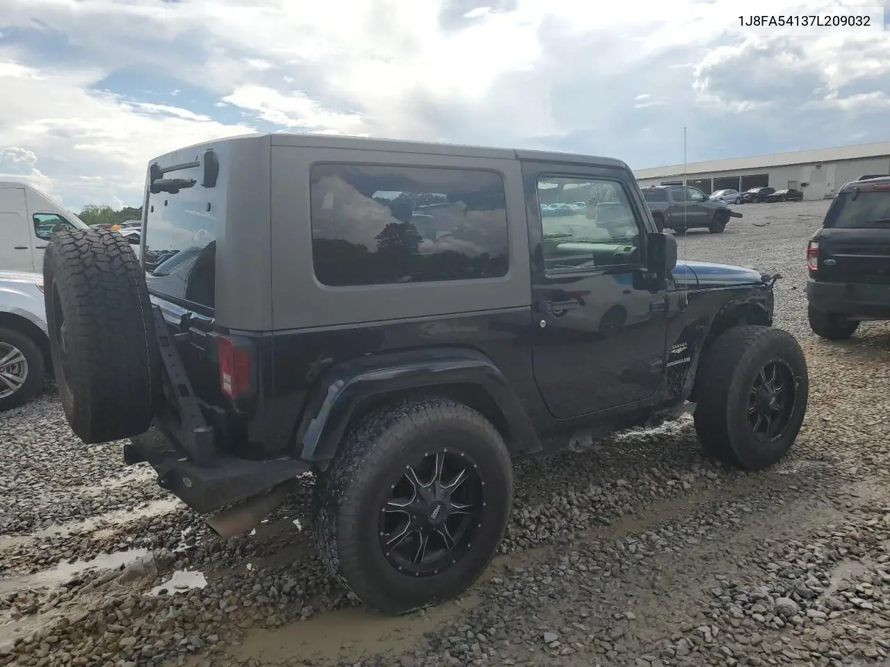 2007 Jeep Wrangler Sahara VIN: 1J8FA54137L209032 Lot: 56502475
