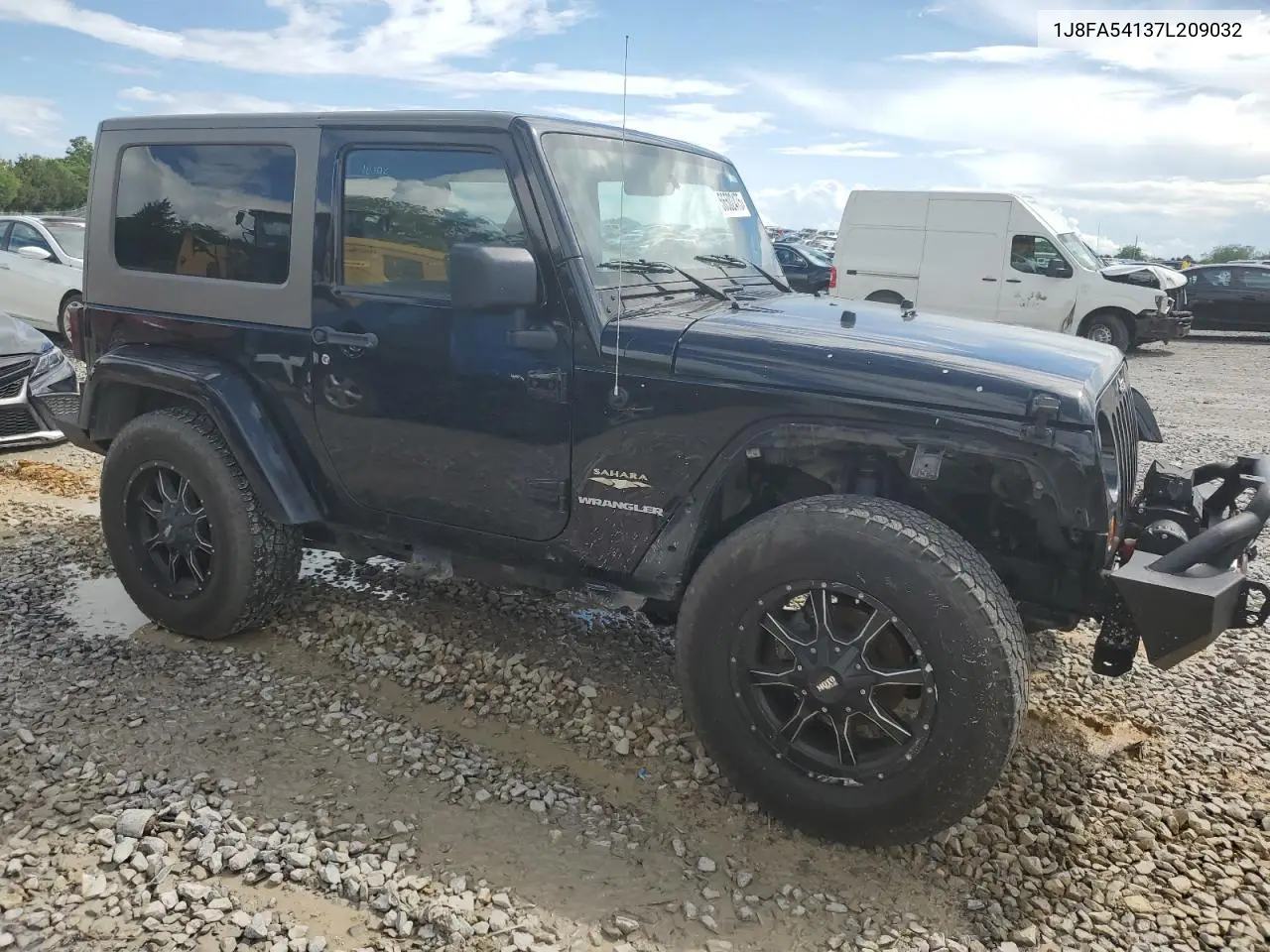 2007 Jeep Wrangler Sahara VIN: 1J8FA54137L209032 Lot: 56502475