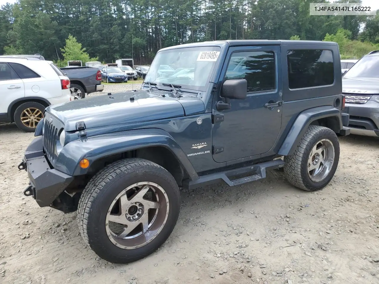 2007 Jeep Wrangler Sahara VIN: 1J4FA54147L165222 Lot: 62819495