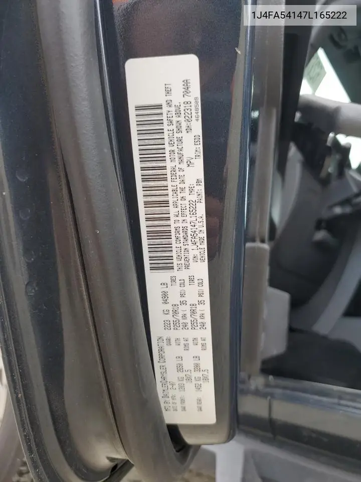 2007 Jeep Wrangler Sahara VIN: 1J4FA54147L165222 Lot: 62819495
