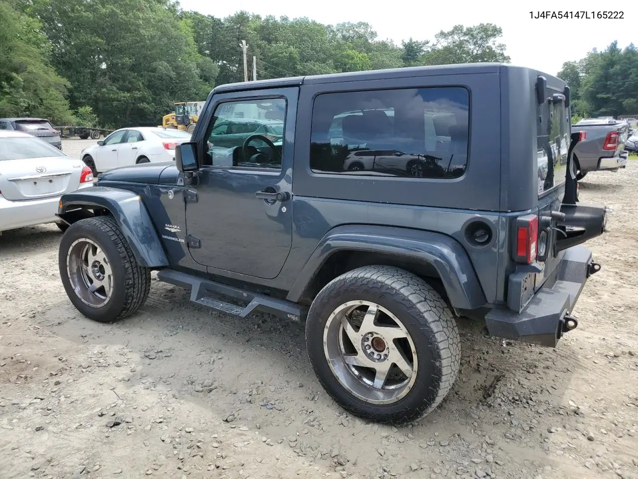 2007 Jeep Wrangler Sahara VIN: 1J4FA54147L165222 Lot: 62819495