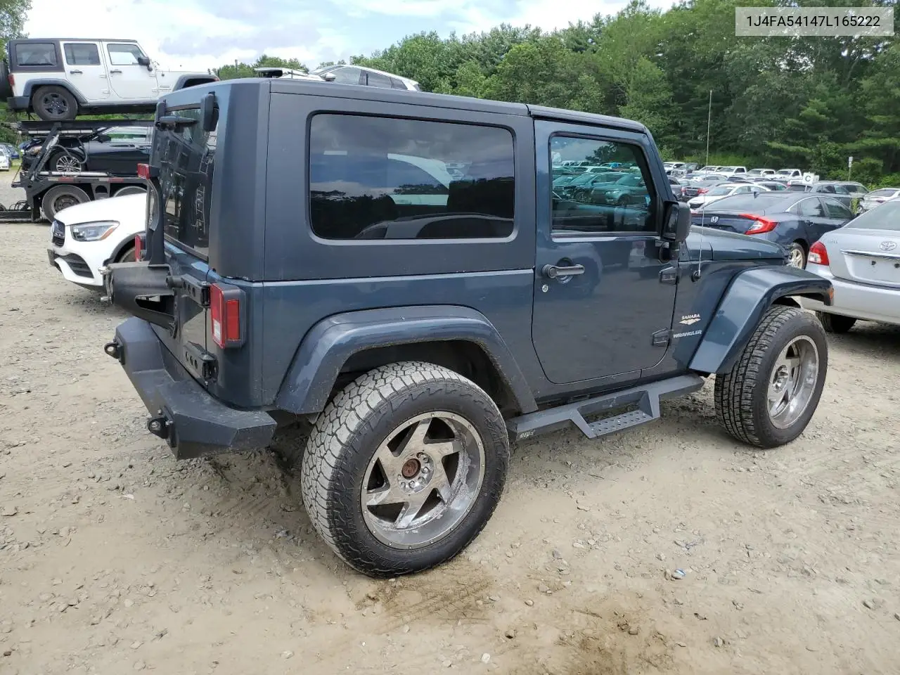 2007 Jeep Wrangler Sahara VIN: 1J4FA54147L165222 Lot: 62819495