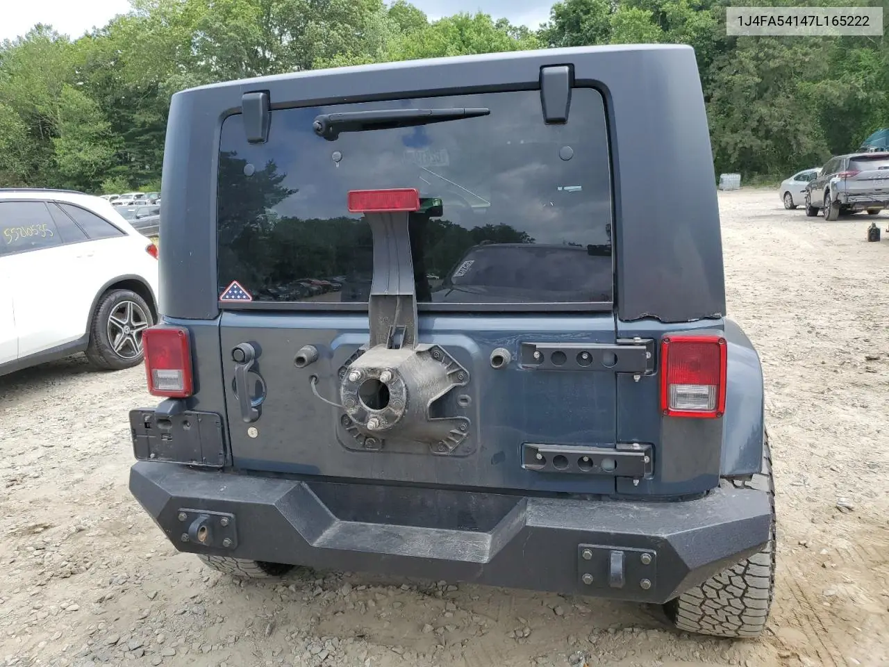2007 Jeep Wrangler Sahara VIN: 1J4FA54147L165222 Lot: 62819495