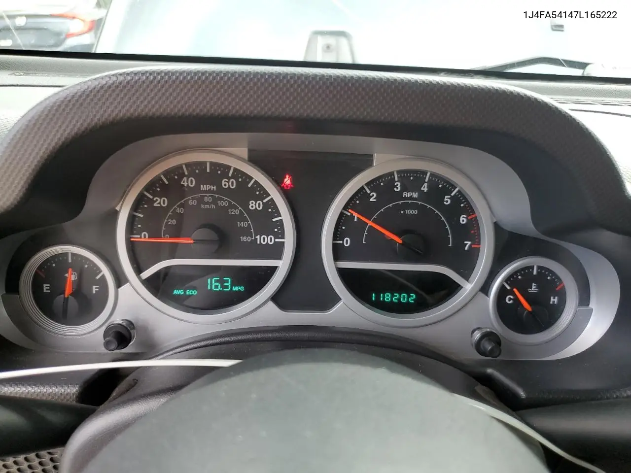 2007 Jeep Wrangler Sahara VIN: 1J4FA54147L165222 Lot: 62819495