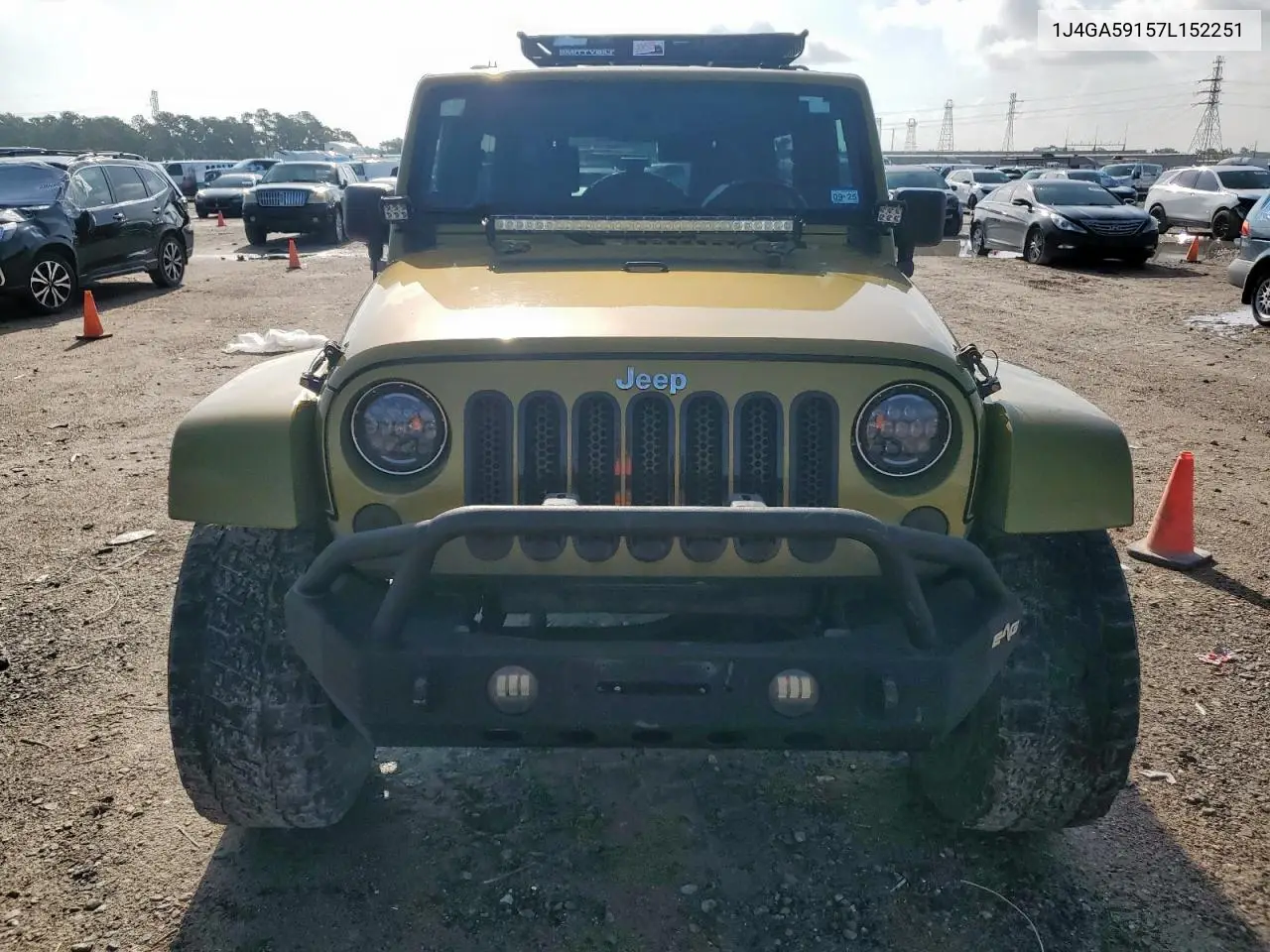 2007 Jeep Wrangler Sahara VIN: 1J4GA59157L152251 Lot: 64802375