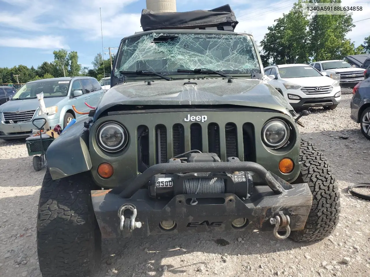 2008 Jeep Wrangler Unlimited Sahara VIN: 1J4GA59188L634858 Lot: 63989065