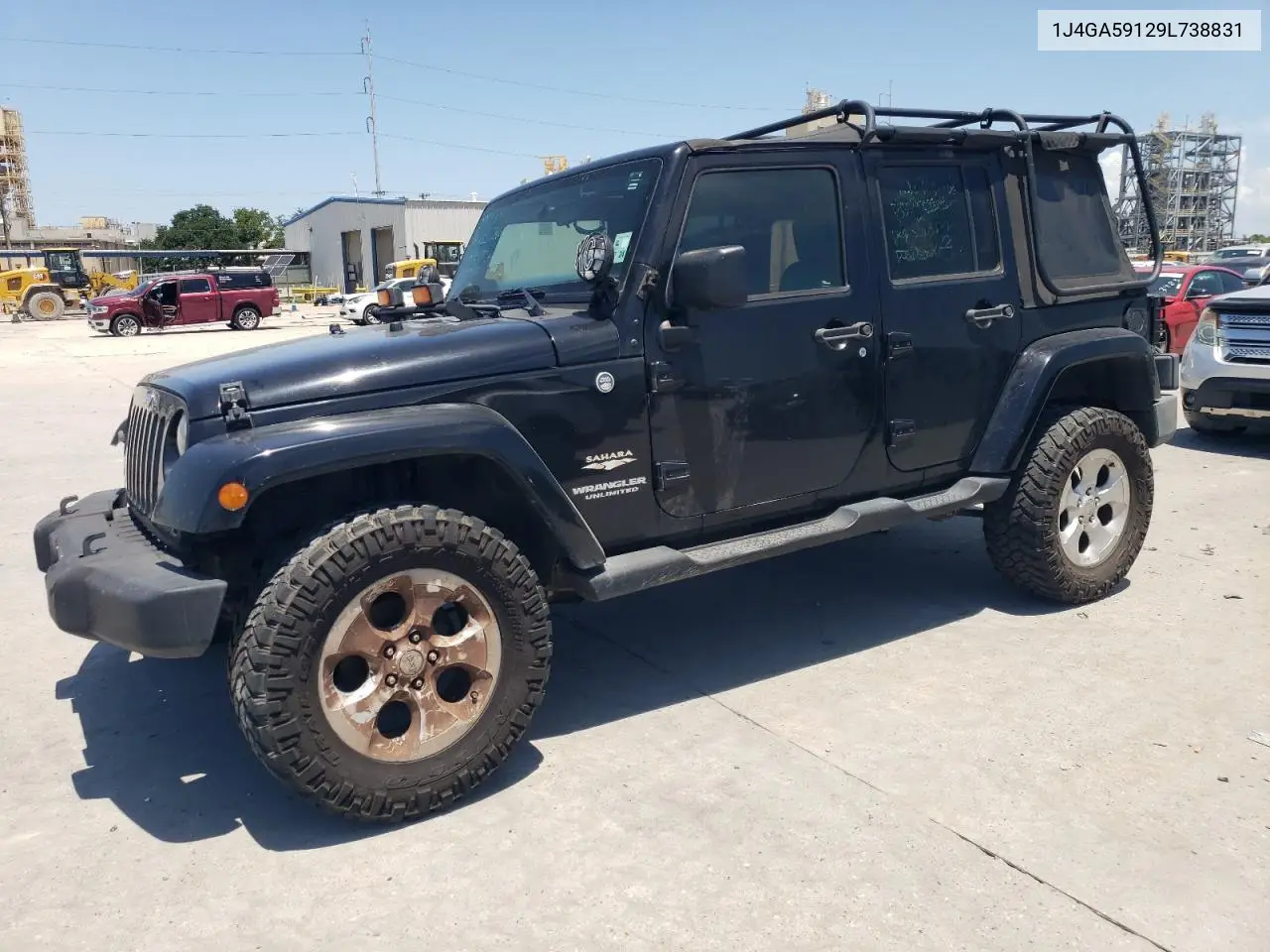 2009 Jeep Wrangler Unlimited Sahara VIN: 1J4GA59129L738831 Lot: 65683625