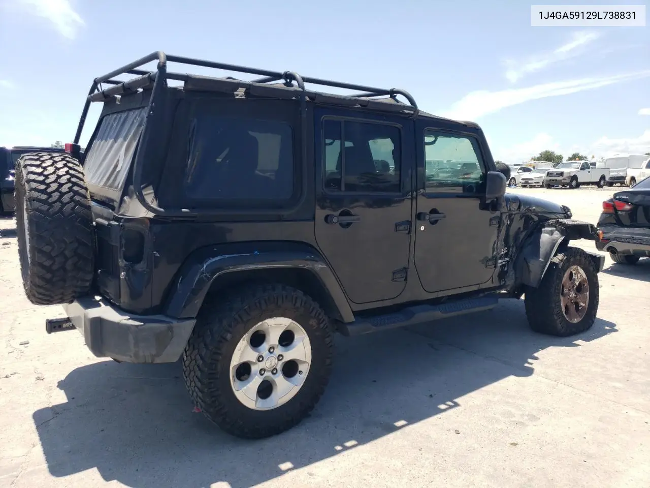 2009 Jeep Wrangler Unlimited Sahara VIN: 1J4GA59129L738831 Lot: 65683625