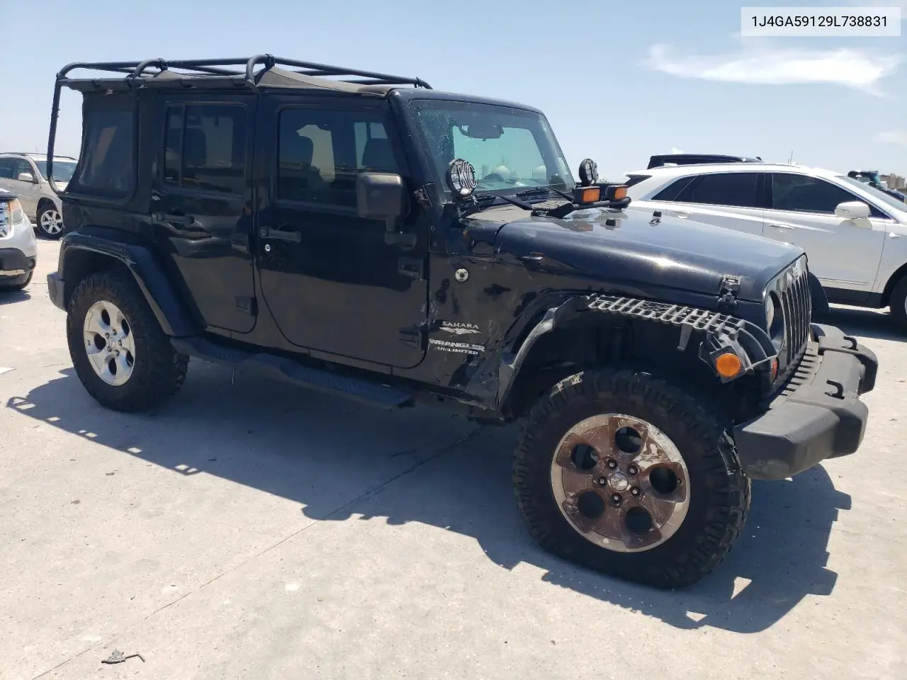 2009 Jeep Wrangler Unlimited Sahara VIN: 1J4GA59129L738831 Lot: 65683625