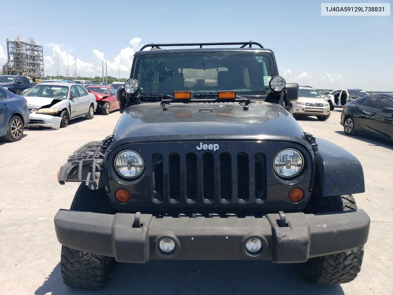 2009 Jeep Wrangler Unlimited Sahara VIN: 1J4GA59129L738831 Lot: 65683625