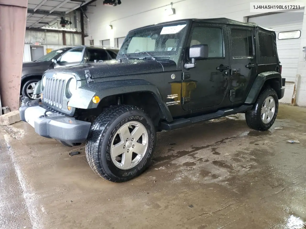 2011 Jeep Wrangler Unlimited Sahara VIN: 1J4HA5H19BL617211 Lot: 55350105