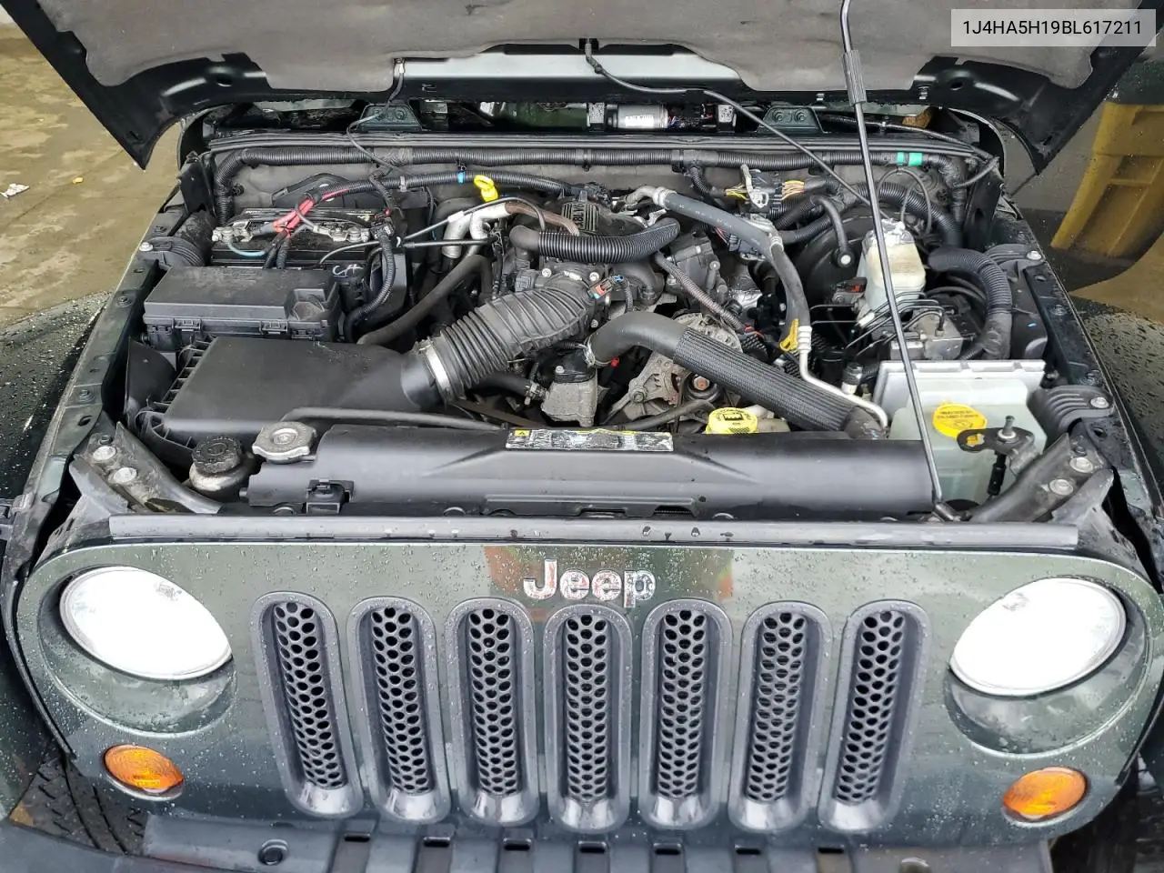 2011 Jeep Wrangler Unlimited Sahara VIN: 1J4HA5H19BL617211 Lot: 55350105