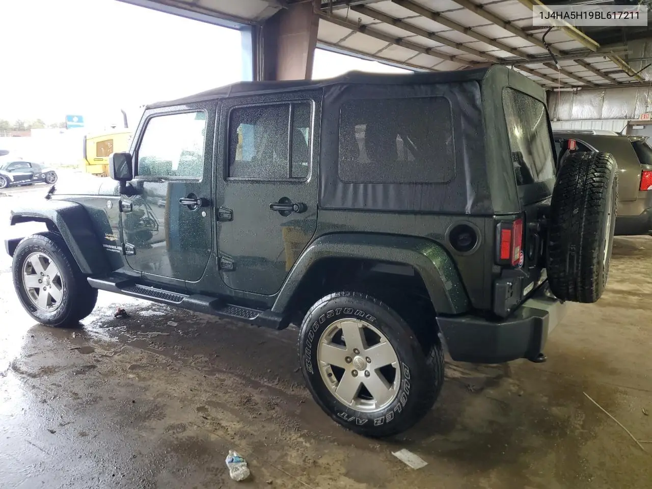 2011 Jeep Wrangler Unlimited Sahara VIN: 1J4HA5H19BL617211 Lot: 55350105