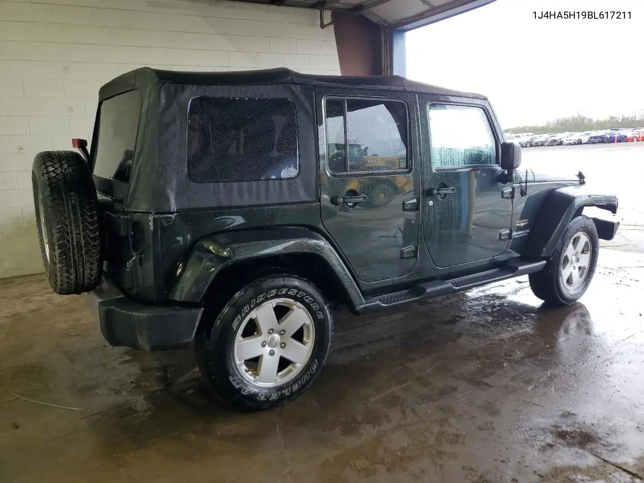 2011 Jeep Wrangler Unlimited Sahara VIN: 1J4HA5H19BL617211 Lot: 55350105