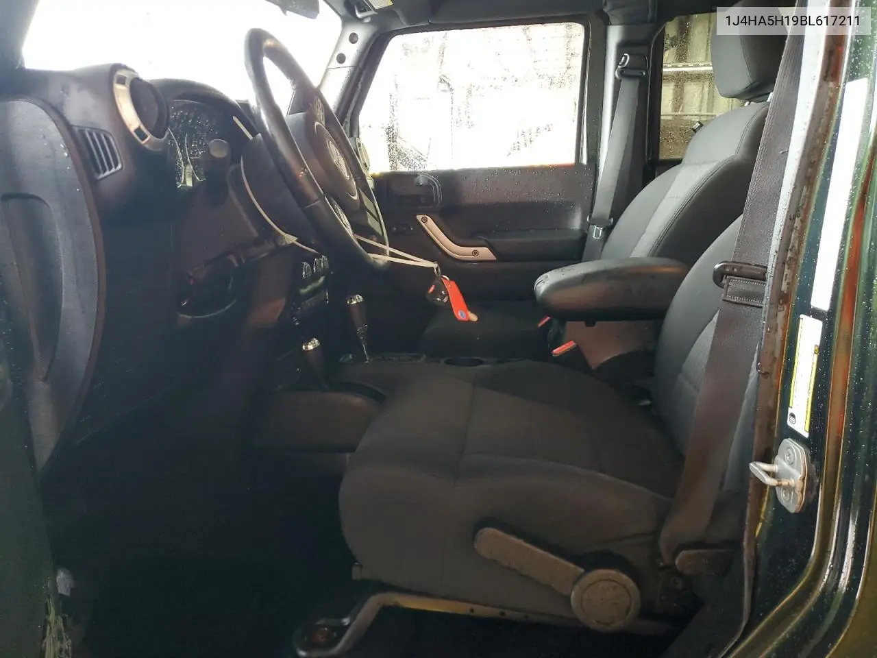 2011 Jeep Wrangler Unlimited Sahara VIN: 1J4HA5H19BL617211 Lot: 55350105
