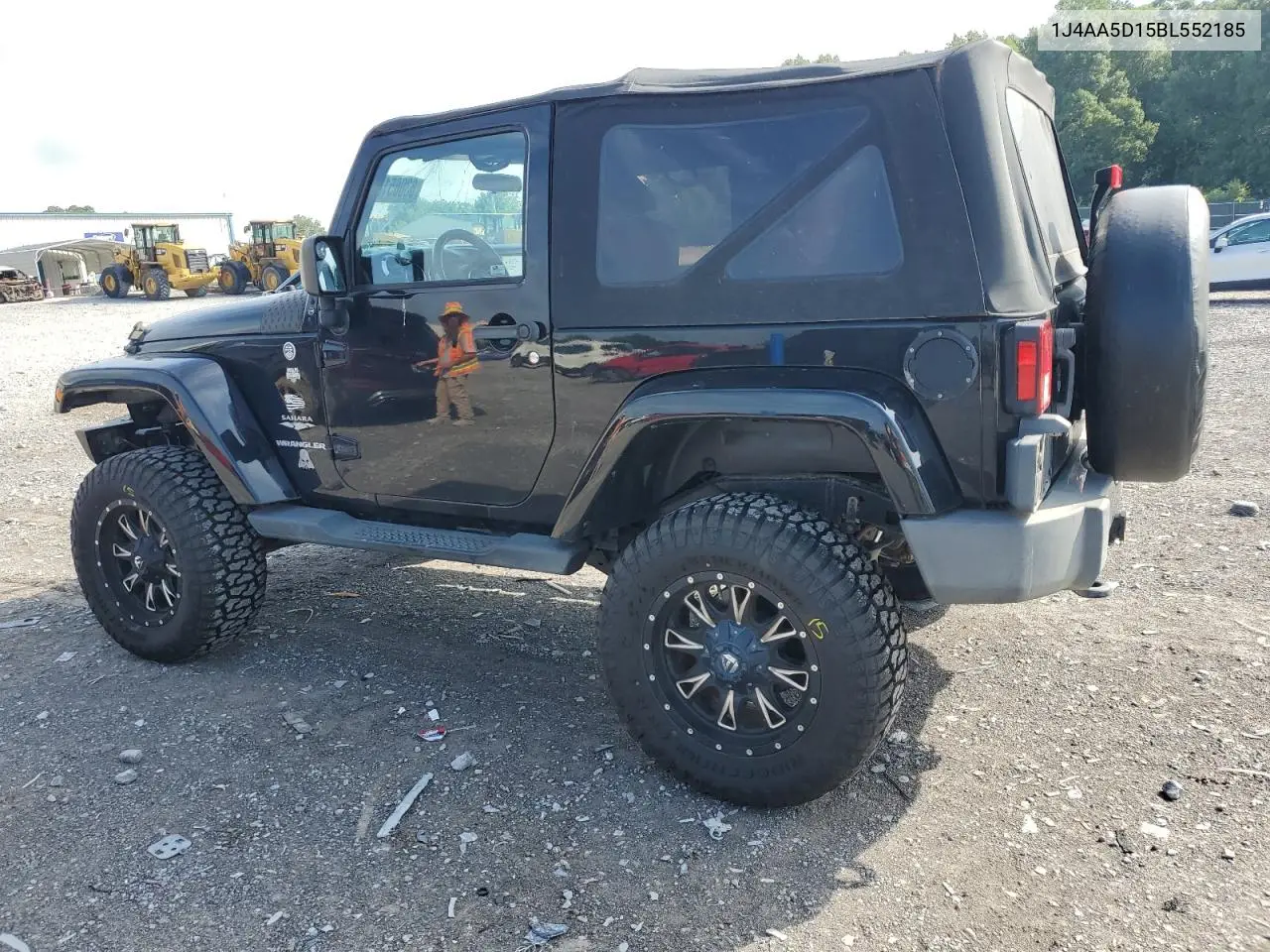 2011 Jeep Wrangler Sahara VIN: 1J4AA5D15BL552185 Lot: 63065185