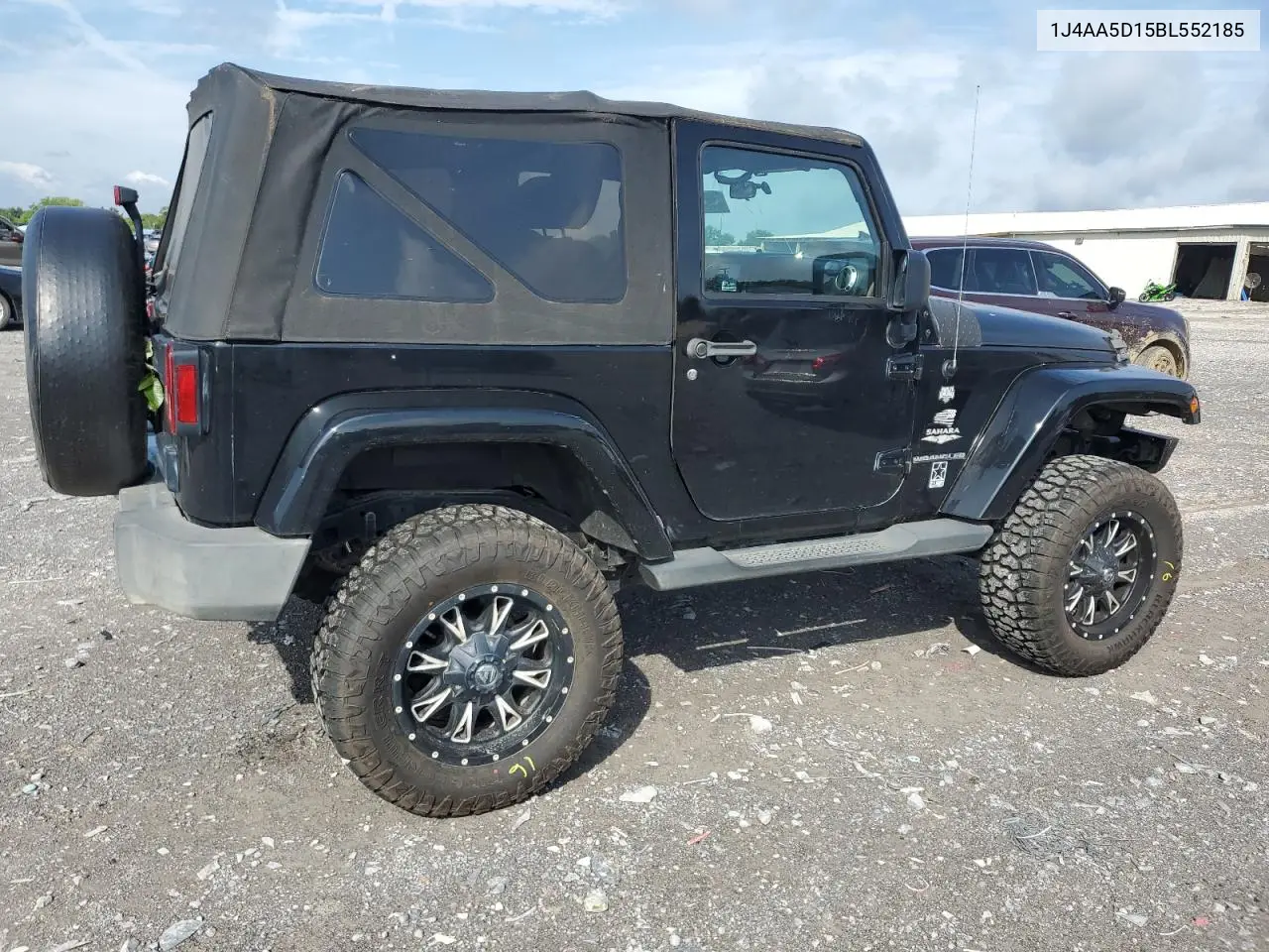2011 Jeep Wrangler Sahara VIN: 1J4AA5D15BL552185 Lot: 63065185