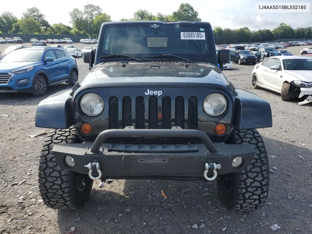 2011 Jeep Wrangler Sahara VIN: 1J4AA5D15BL552185 Lot: 63065185