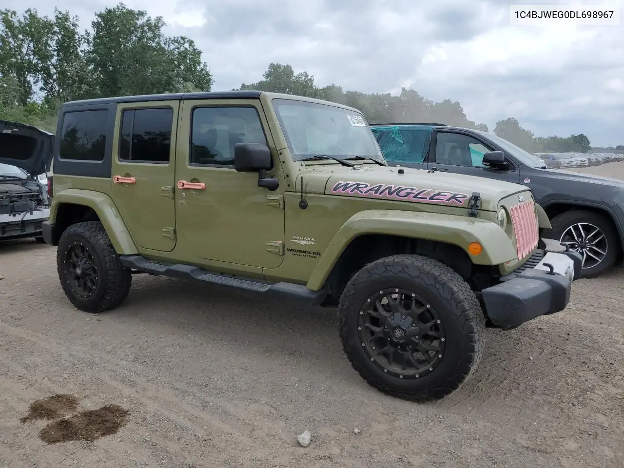 2013 Jeep Wrangler Unlimited Sahara VIN: 1C4BJWEG0DL698967 Lot: 62755435