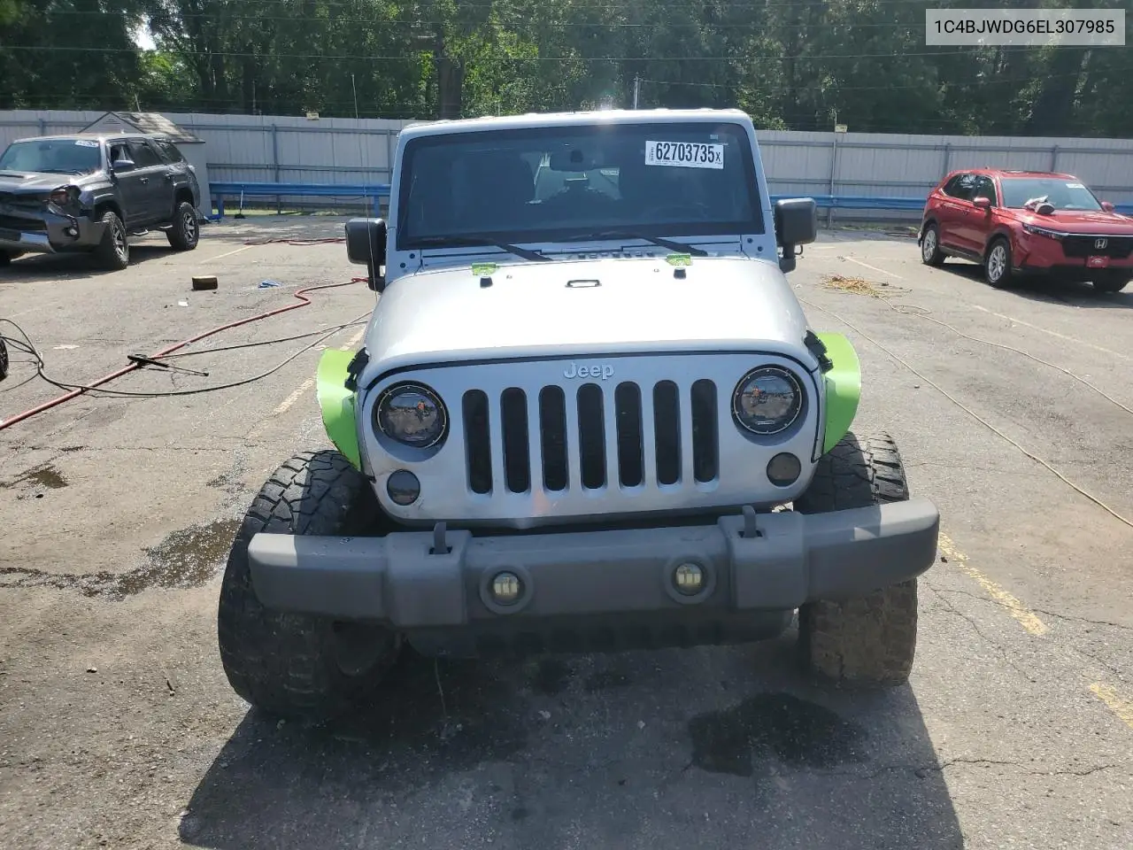 2014 Jeep Wrangler Unlimited Sport VIN: 1C4BJWDG6EL307985 Lot: 62703735