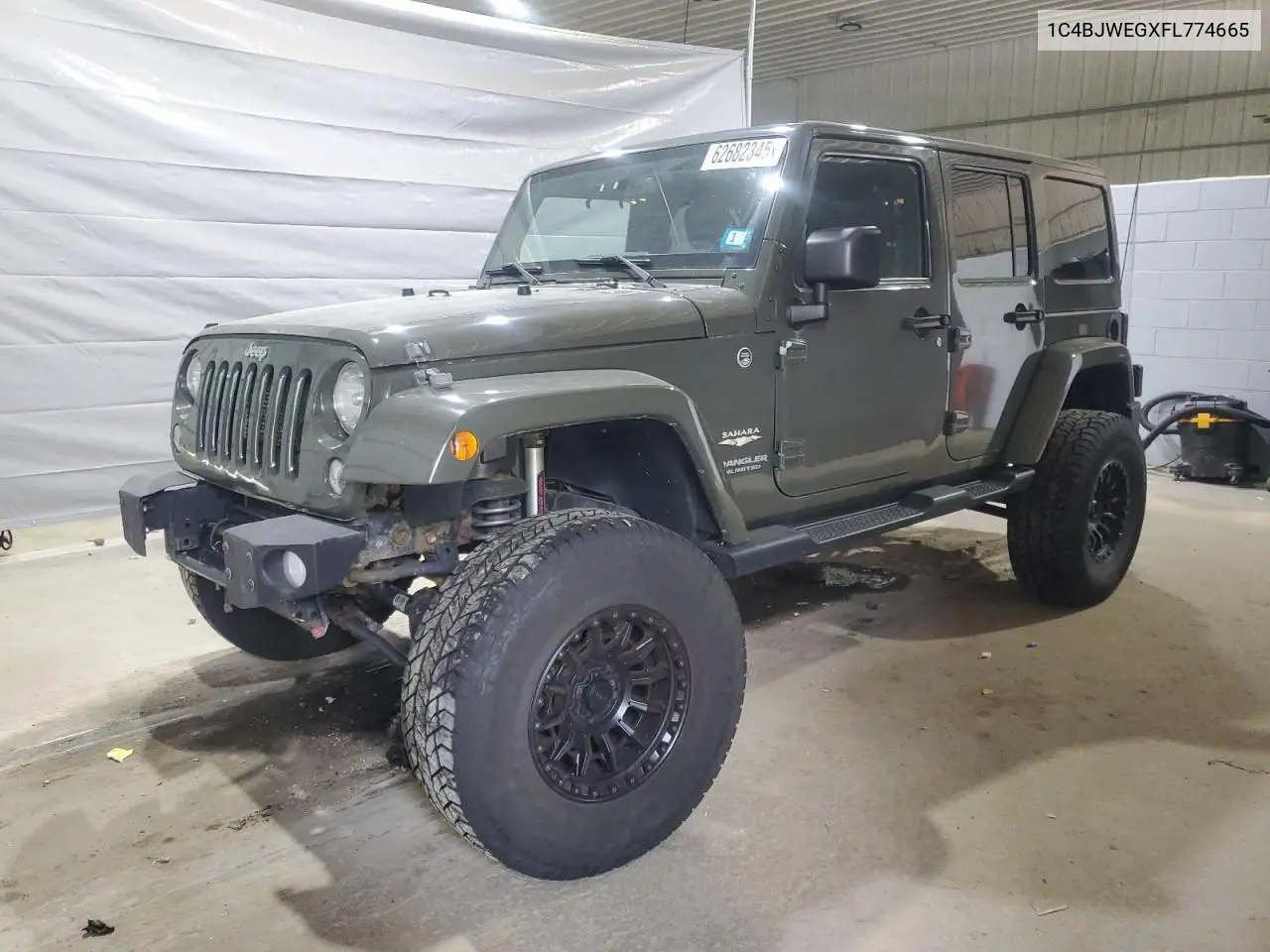 2015 Jeep Wrangler Unlimited Sahara VIN: 1C4BJWEGXFL774665 Lot: 62682345