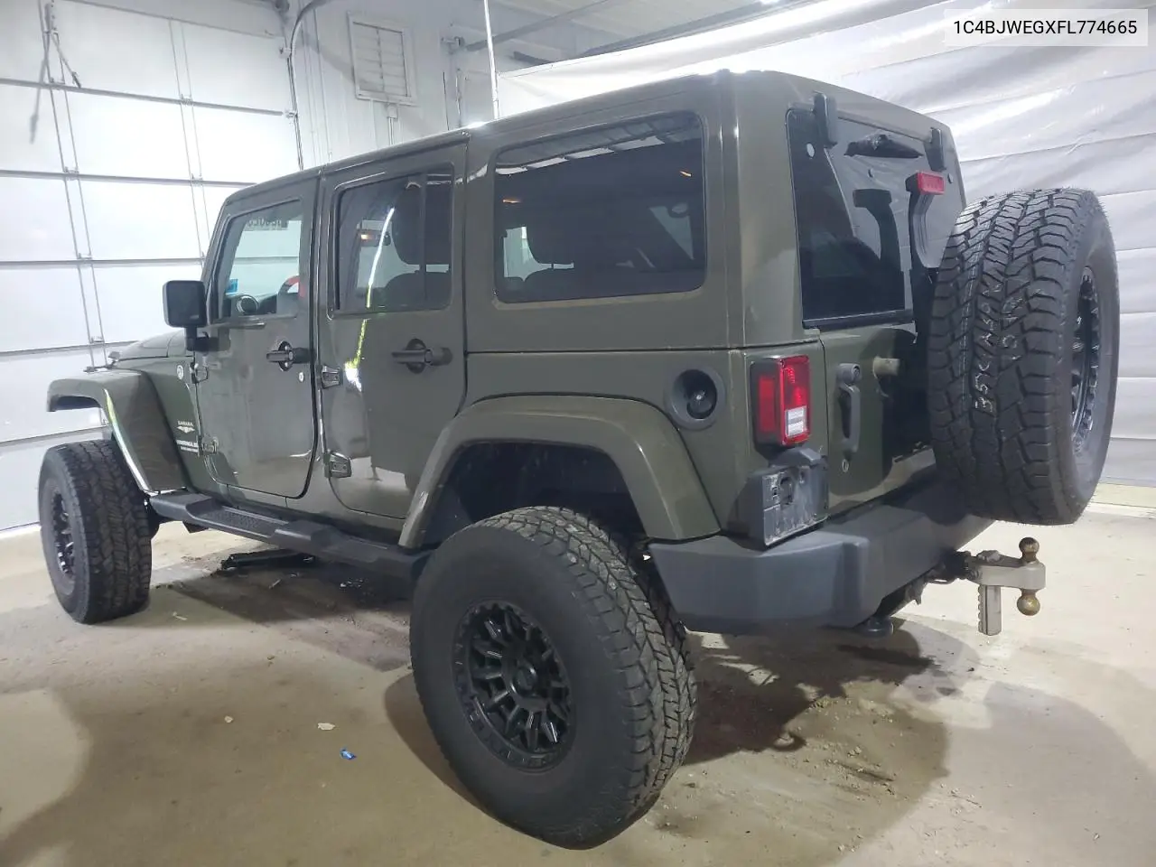 2015 Jeep Wrangler Unlimited Sahara VIN: 1C4BJWEGXFL774665 Lot: 62682345