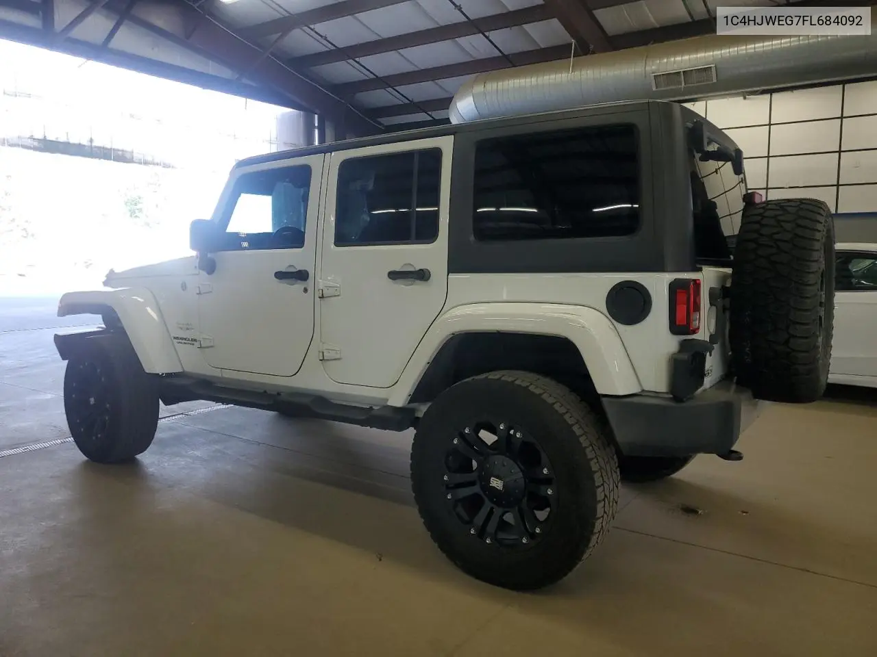 2015 Jeep Wrangler Unlimited Sahara VIN: 1C4HJWEG7FL684092 Lot: 66388105