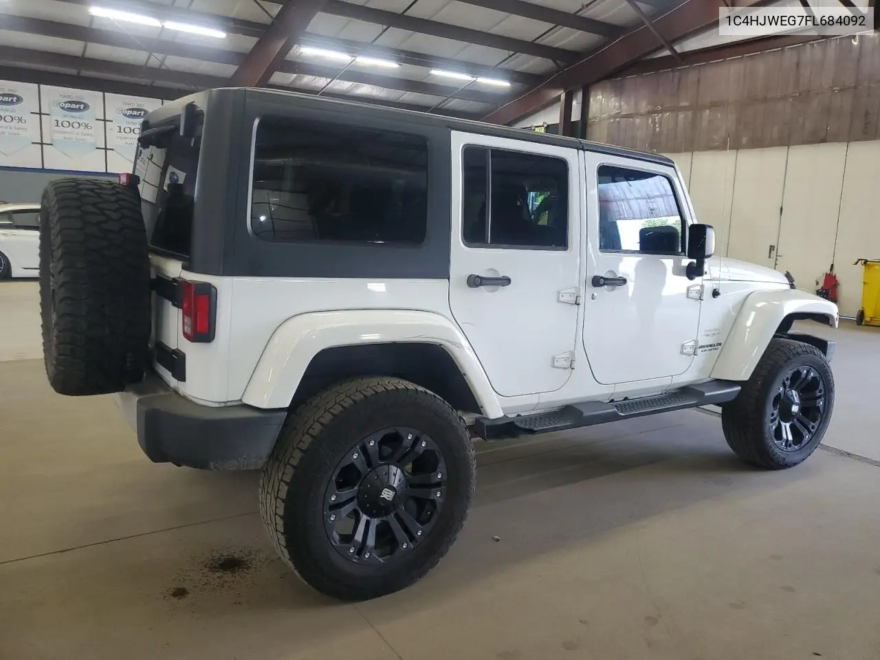 2015 Jeep Wrangler Unlimited Sahara VIN: 1C4HJWEG7FL684092 Lot: 66388105