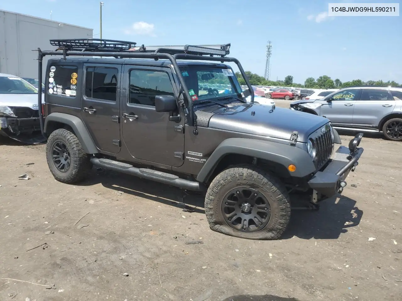 2017 Jeep Wrangler Unlimited Sport VIN: 1C4BJWDG9HL590211 Lot: 62716075