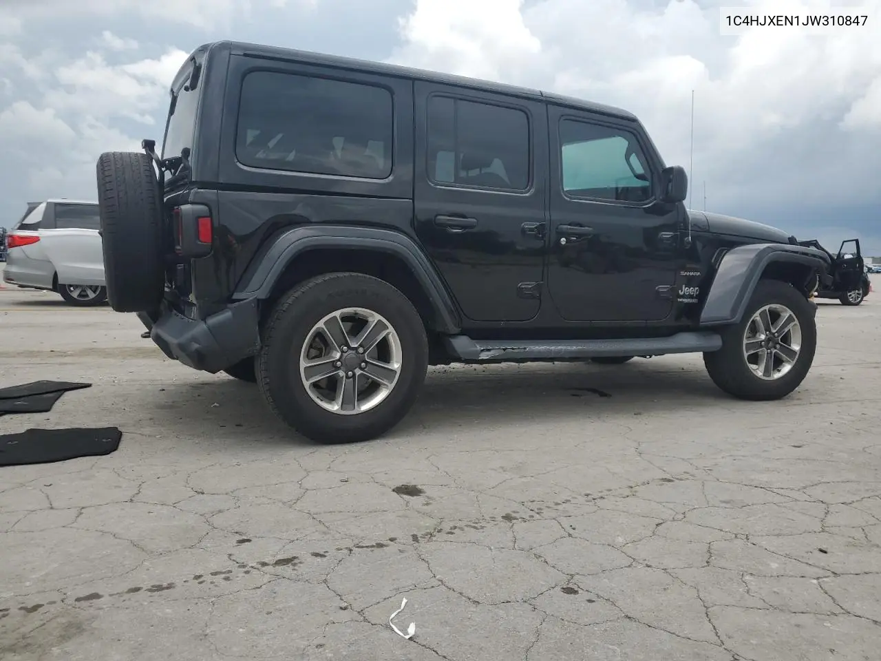 2018 Jeep Wrangler Unlimited Sahara VIN: 1C4HJXEN1JW310847 Lot: 62911995