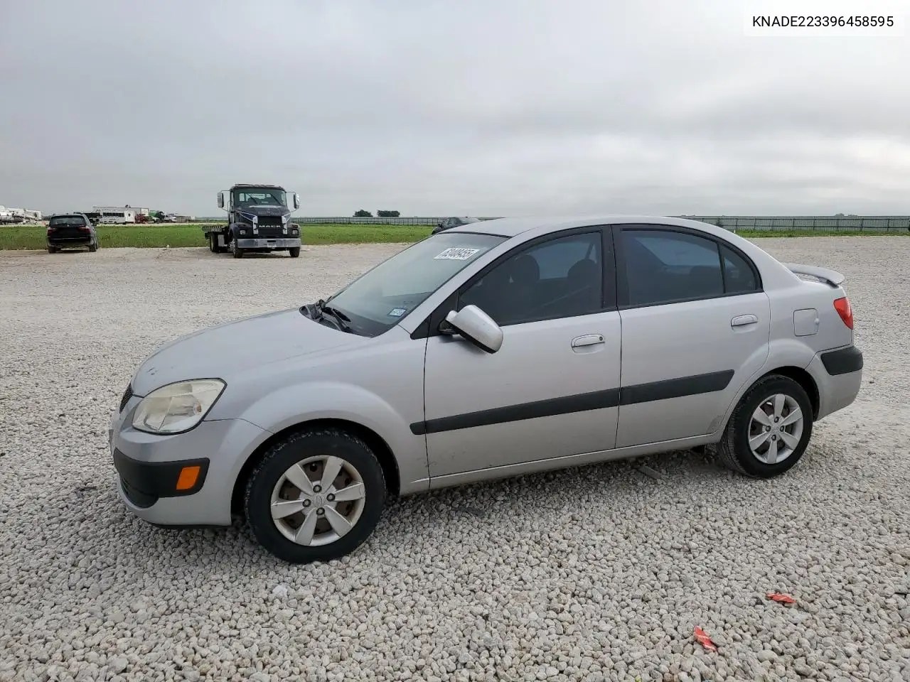 2009 Kia Rio Base VIN: KNADE223396458595 Lot: 62408455