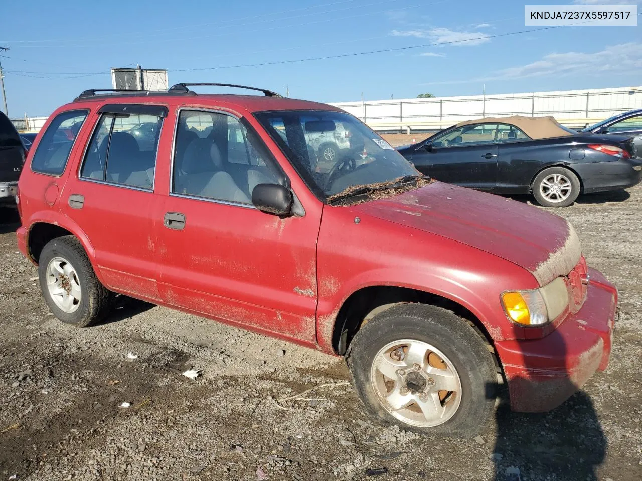 1999 Kia Sportage VIN: KNDJA7237X5597517 Lot: 82673504