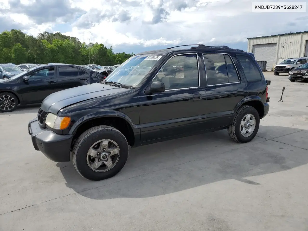 2000 Kia Sportage VIN: KNDJB7239Y5628247 Lot: 52766485