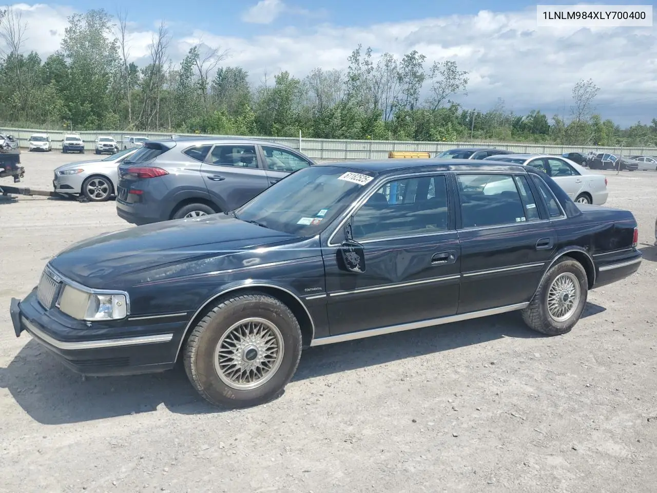 1990 Lincoln Continental Signature VIN: 1LNLM984XLY700400 Lot: 61182525