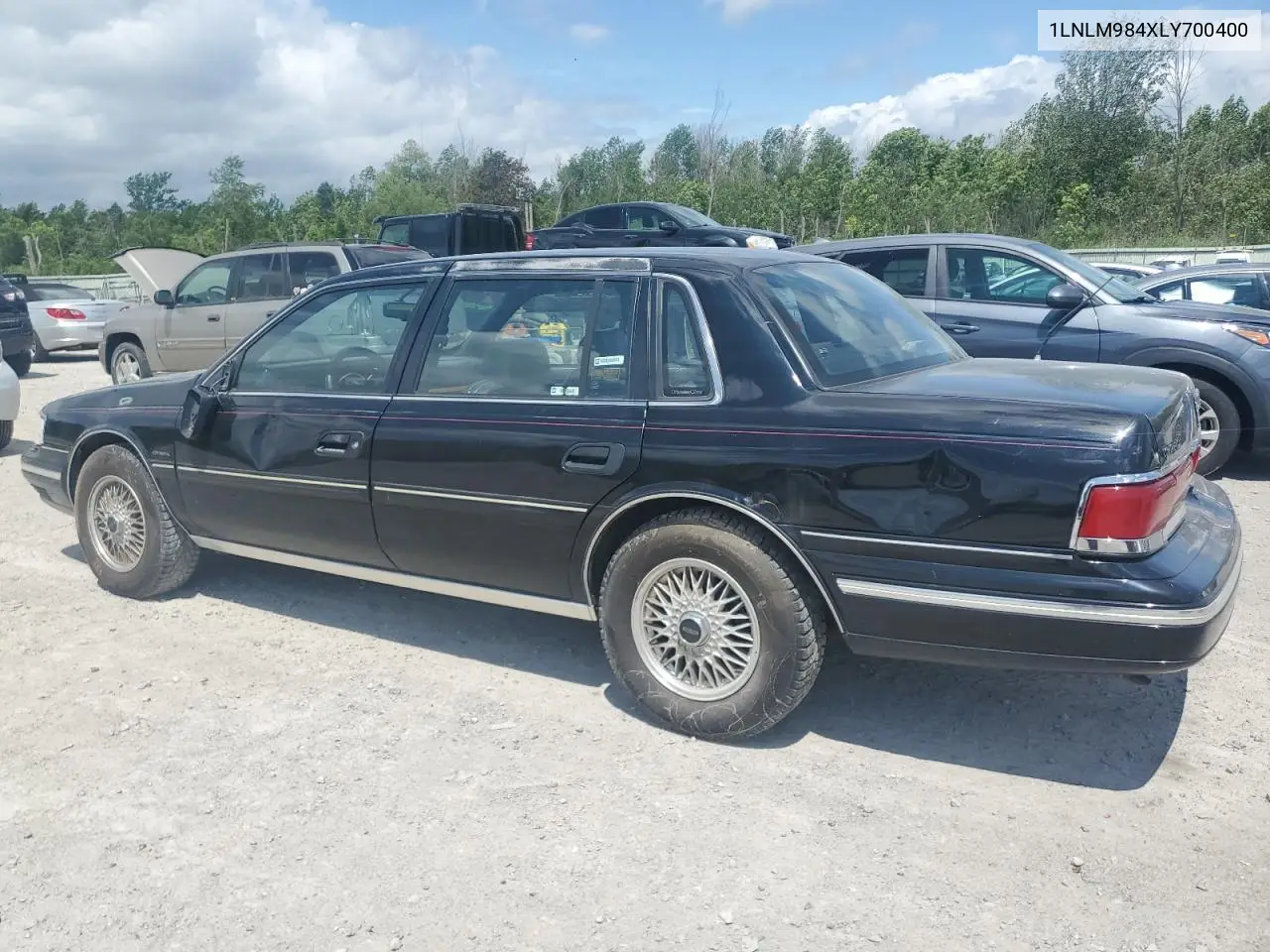 1990 Lincoln Continental Signature VIN: 1LNLM984XLY700400 Lot: 61182525